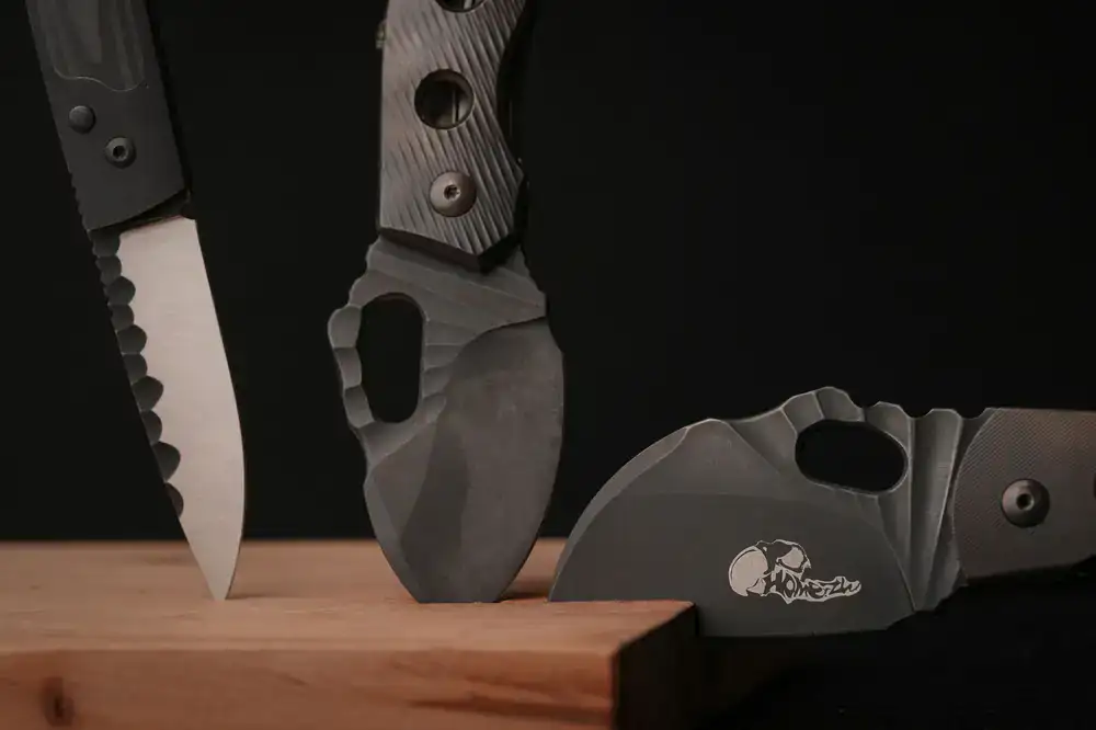 Close up of knife handles on a wooden shop display